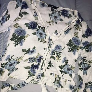 womans floral blouse